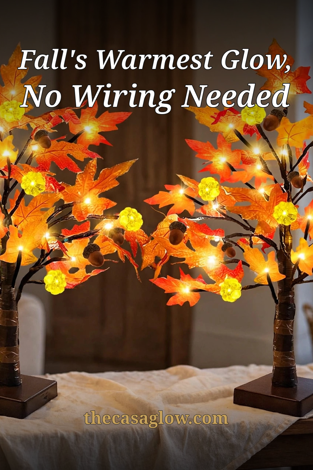 Pinterest pin: lit fall maple trees — 'Fall's Warmest Glow, No Wiring Needed'