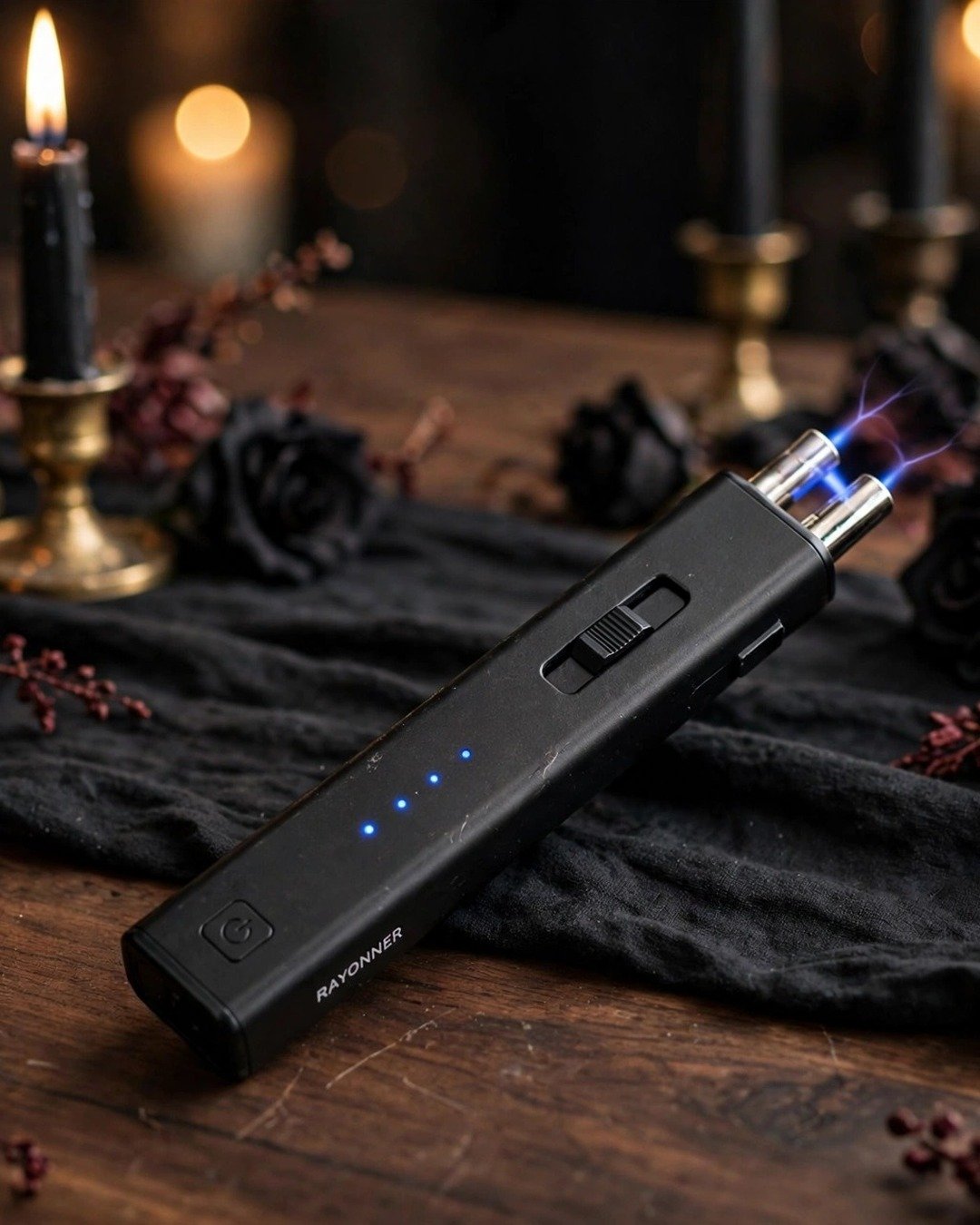 RAYONNER electric arc candle lighter with plasma arc glowing over a gothic Halloween candle tablescape