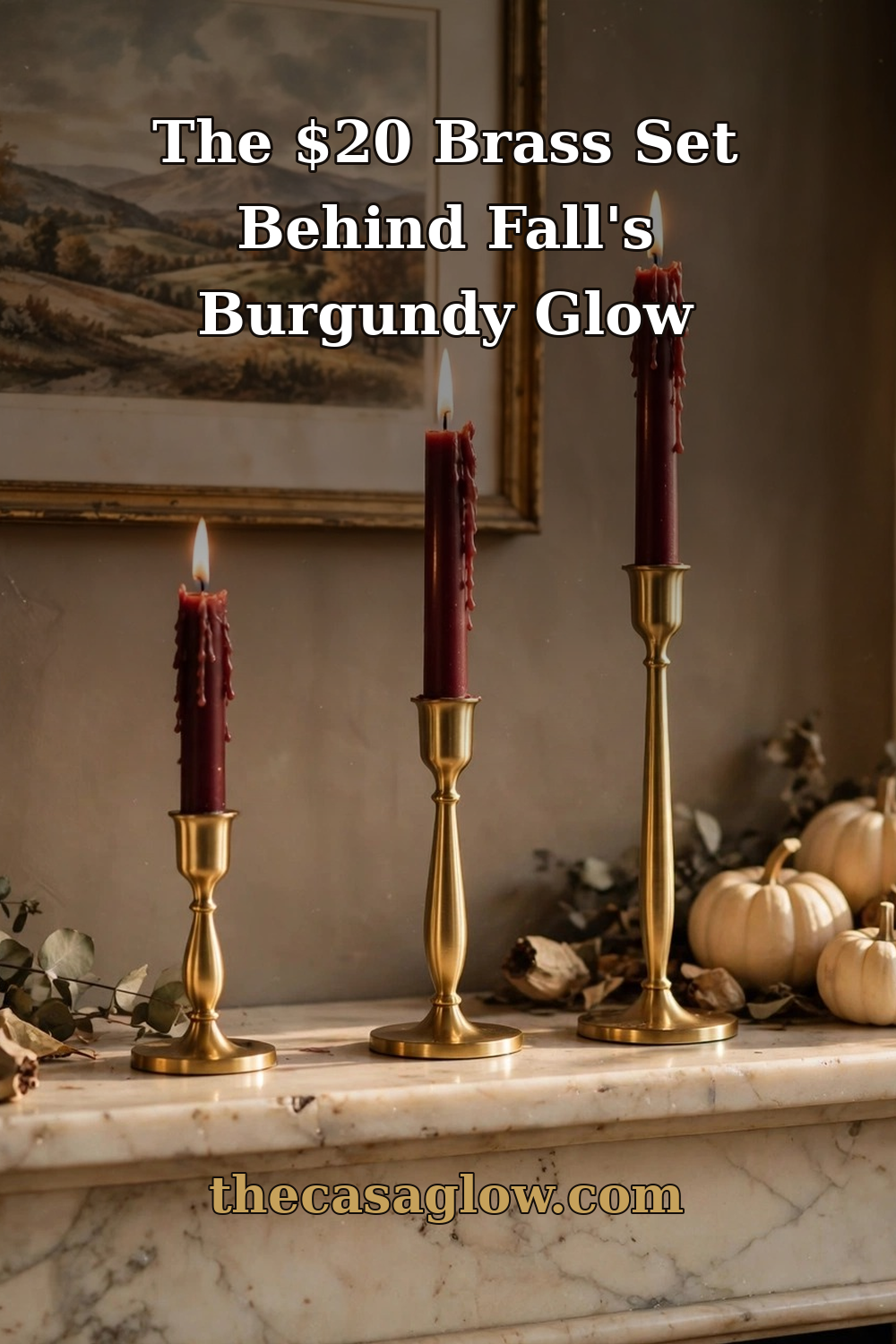The $20 brass taper holder set behind fall's burgundy glow — burgundy fall decor idea