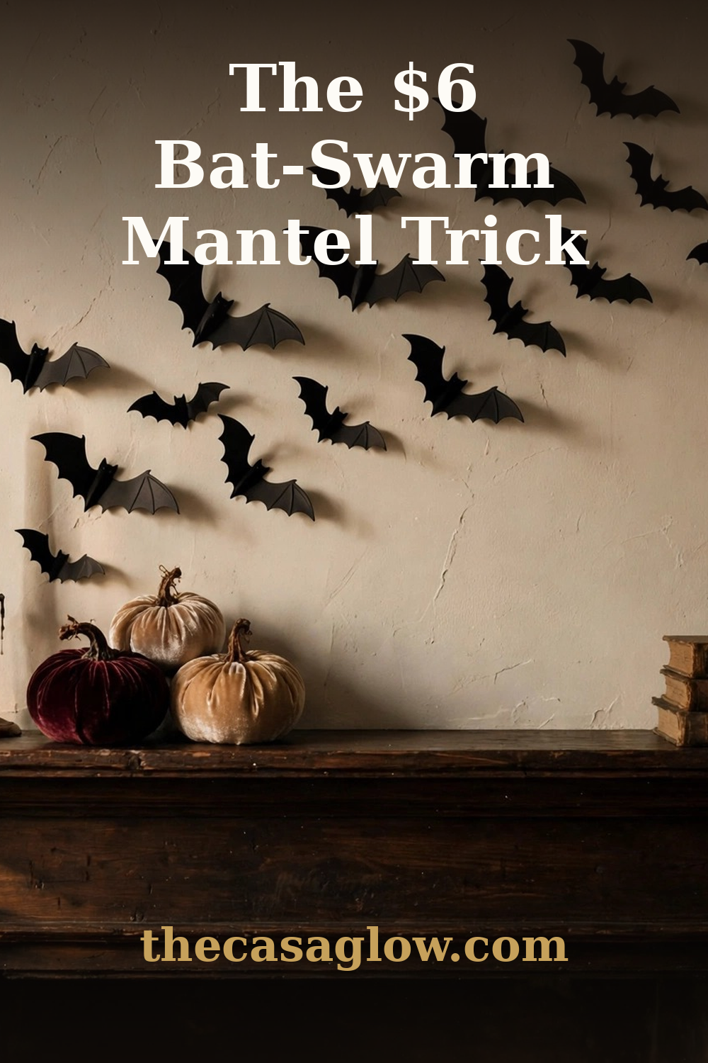 Gothic bat swarm Halloween wall installation above a mantel with candlelight