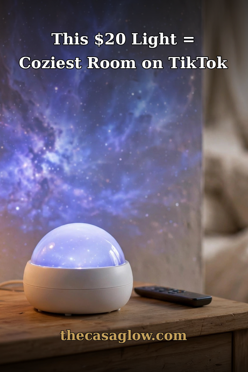 White dome galaxy projector glowing violet-blue on a nightstand with its remote, galaxy light projected behind it