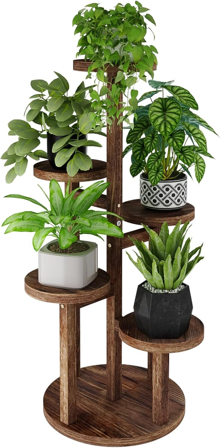 5 tiered walnut wooden plant stand holding potted green plants