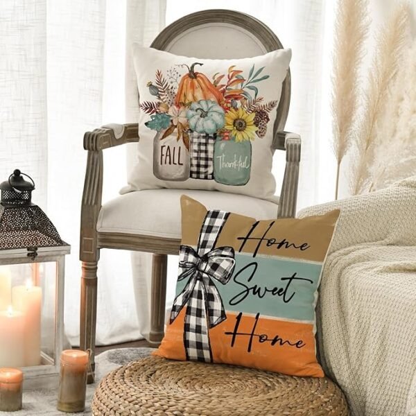 AVOIN fall pumpkin throw pillow covers set of 4 with Home Sweet Home script and harvest prints on a cozy sofa